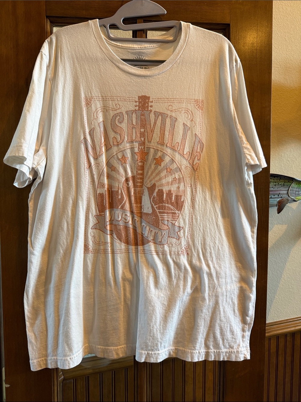 White Nashville Graphic Short Sleeve Tee with Faded Orange Print